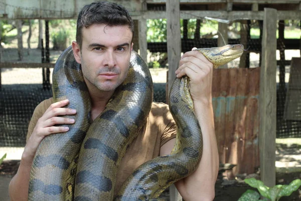Man Showing Affection Gigantic Snake — 스톡 사진