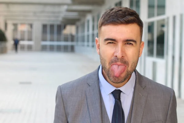 Close Portrait Handsome Young Businessman Sticking Tongue Out Street — Stock Photo, Image