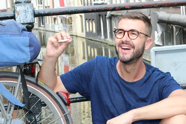 Man Smiling Amsterdam While Holding Joint — 스톡 사진