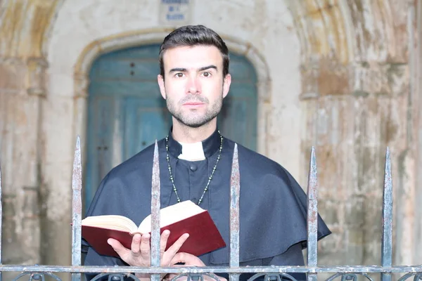 Close Portrait Handsome Young Priest Holy Bible Front Cathedral — Stock Photo, Image