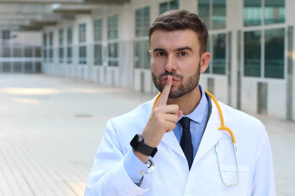 Close Portrait Handsome Young Doctor Showing Silence Gesture Street — 스톡 사진