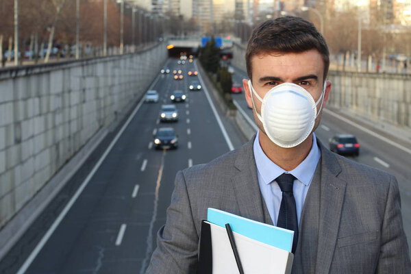 Businessman wearing breathing a mask