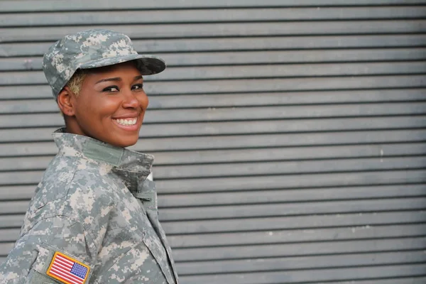 African American Woman Soldier Standing Outdoors At Daytime