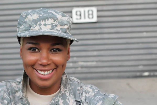 African American Woman Soldier Standing Outdoors At Daytime