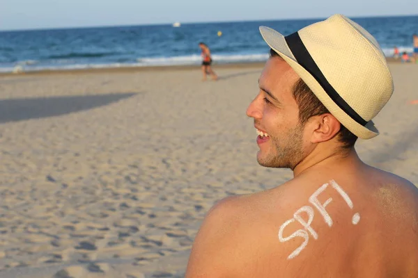 Man protecting his skin against the sun