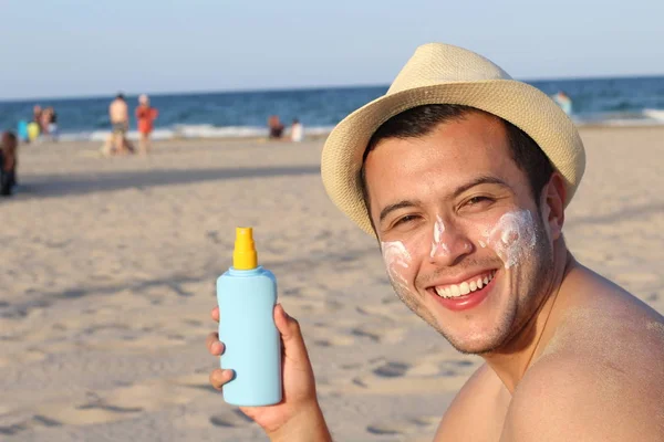 Man protecting his skin against the sun