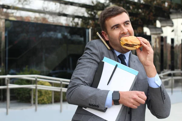 Close Portrait Handsome Young Businessman Suit Talking Phone Eating Burger — 图库照片