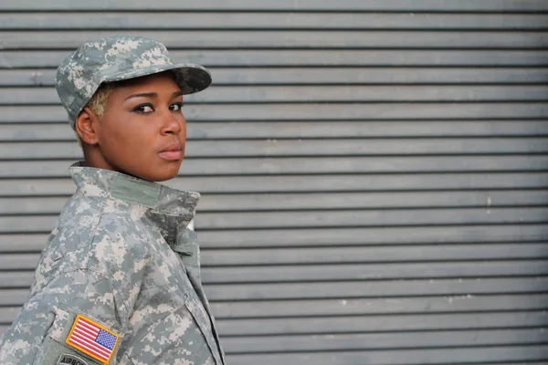 African American Woman Soldier Standing Outdoors At Daytime