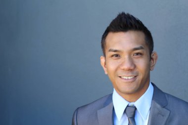 Portrait of a confident Asian lawyer outside