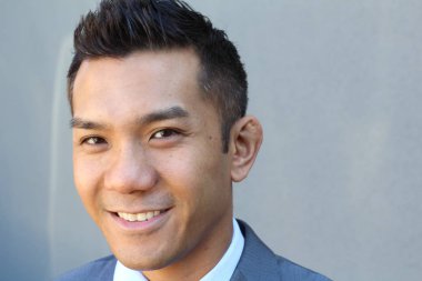 Portrait of a confident Asian lawyer outside