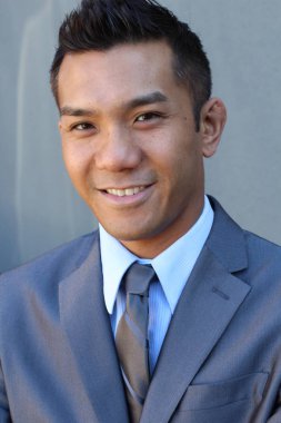 Portrait of a confident Asian lawyer outside