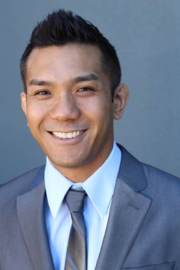 Portrait of a confident Asian lawyer outside