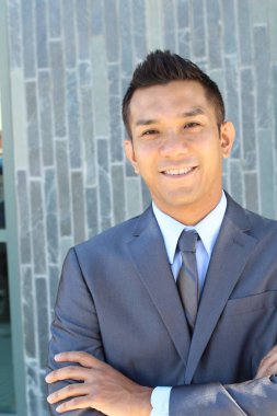 Portrait of a confident Asian lawyer outside