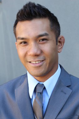 Portrait of a confident Asian lawyer outside