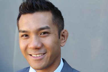 Portrait of a confident Asian lawyer outside