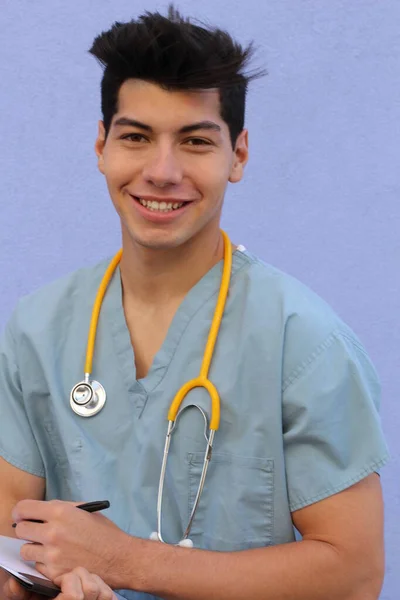 Primer Plano Retrato Guapo Joven Médico Frente Pared Azul —  Fotos de Stock