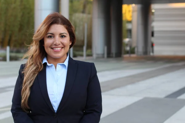 Beautiful smiley confident businesswoman portrait outside