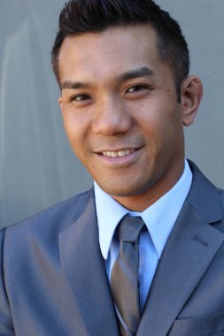 Portrait of a confident Asian lawyer outside