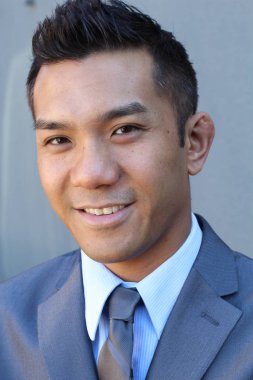 Portrait of a confident Asian lawyer outside