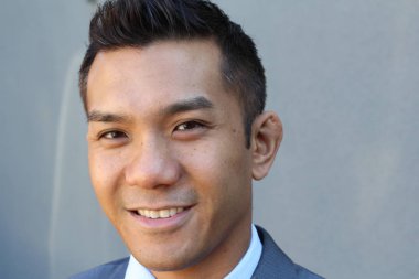 Portrait of a confident Asian lawyer outside