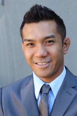 Portrait of a confident Asian lawyer outside