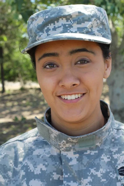 Happy healthy ethnic army female soldier