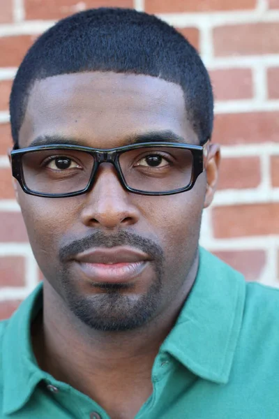 Closeup Young Black Man Wearing Eyeglasses Looking Camera Brick Wall — Stock Photo, Image