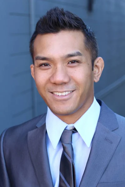 Close Portrait Handsome Young Businessman Mixed Race Front Blue Wall — Stock Photo, Image