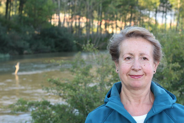 Portrait of elder lady standing in park