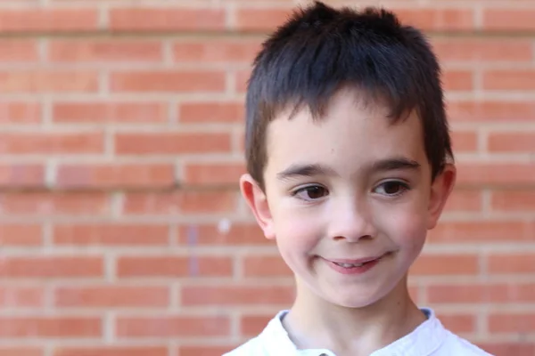 Closeup Portrait Cute Little Boy Standing Brick Wall Background — 스톡 사진