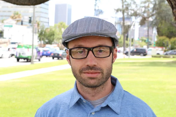 Male with hipster look in the city