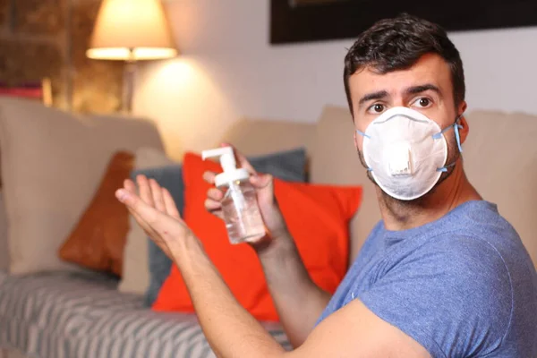 Sick Man Using Hand Sanitizer Home — Stock Photo, Image