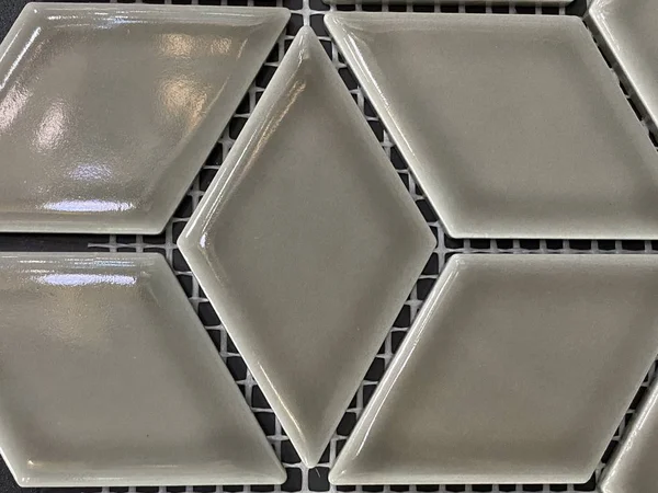 gray tile with a rhombus pattern
