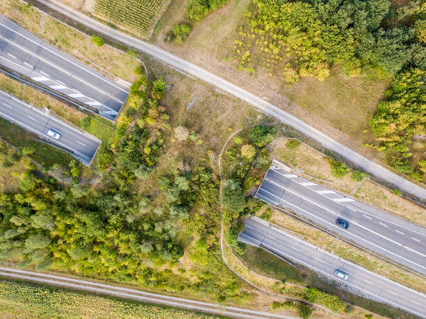 Aerial view of wildlife overpass over highway in Switzerland