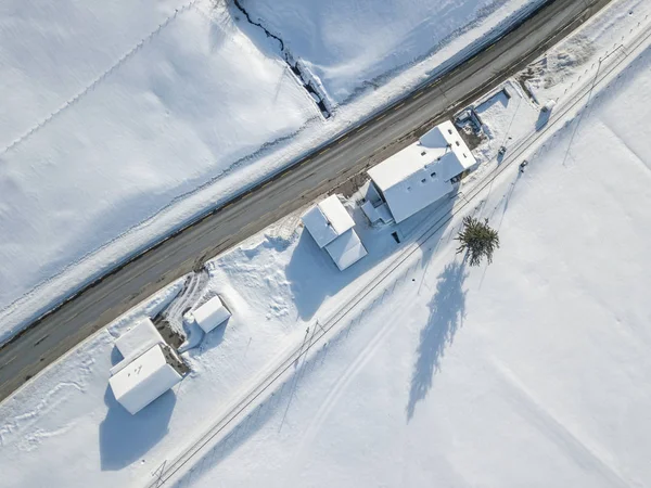 Aerial View Cottage Snow Covered Roof — 스톡 사진