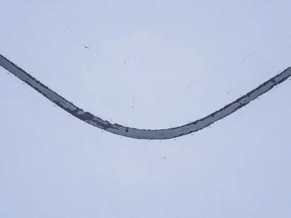 Karla Kaplı Arazide Yolun Havadan Görünüşü — Stok fotoğraf