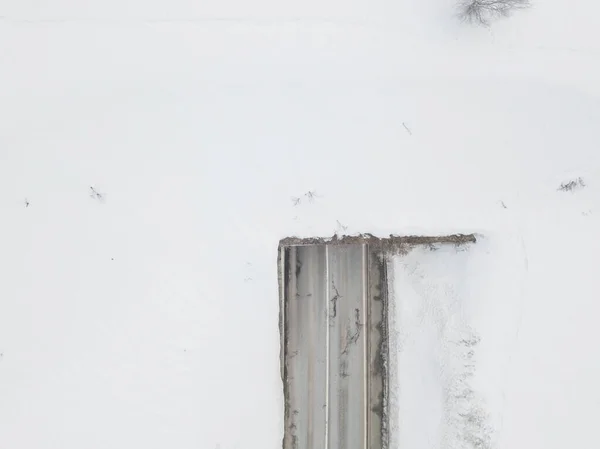 Flygfoto Vägen Genom Snötäckta Landskap — Stockfoto