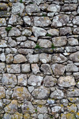 Arka planda taş duvar dokusu