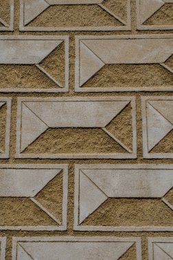 Arka planda simetrik taş duvar, kapat