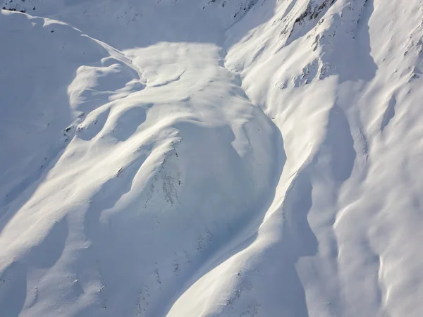 Vista Aérea Terreno Coberto Neve Área Montanha Montanhas — Fotografia de Stock