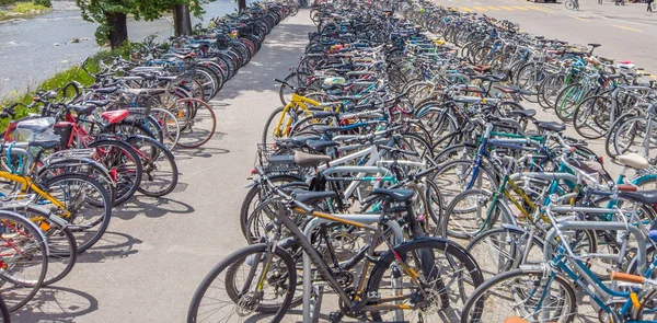 Bicycles parking with many cycles in Zurich, Switzerland. Ecological mode of transport for urban lifestyle.