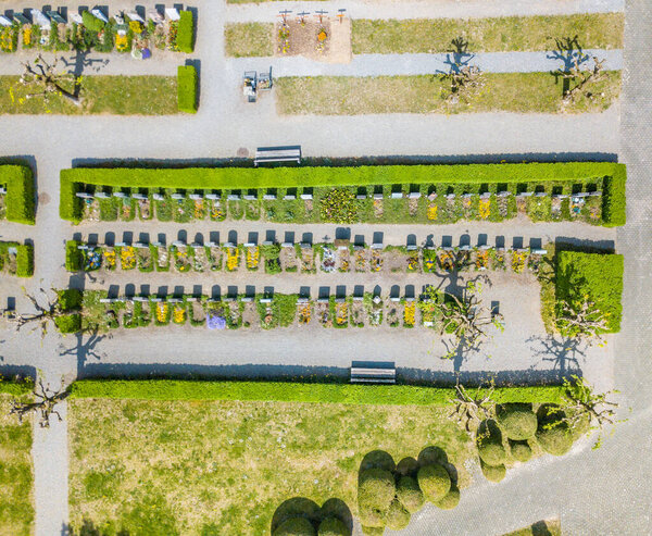 Aerial view of tranquil cemetery in Europe. Concept of grave yard.