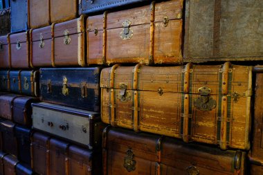 Old travel suitcases in various colors