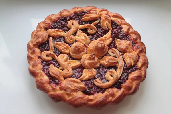 Homemade Russian golden lingonberry pie. Crispy crust.