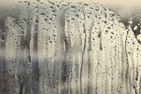 Vidrio húmedo gotas de agua patrón de textura de fondo . — Foto de Stock