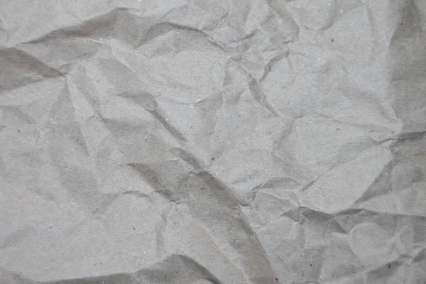 Resumen arrugado destaques de papel gris para el diseño decorativo . — Foto de Stock