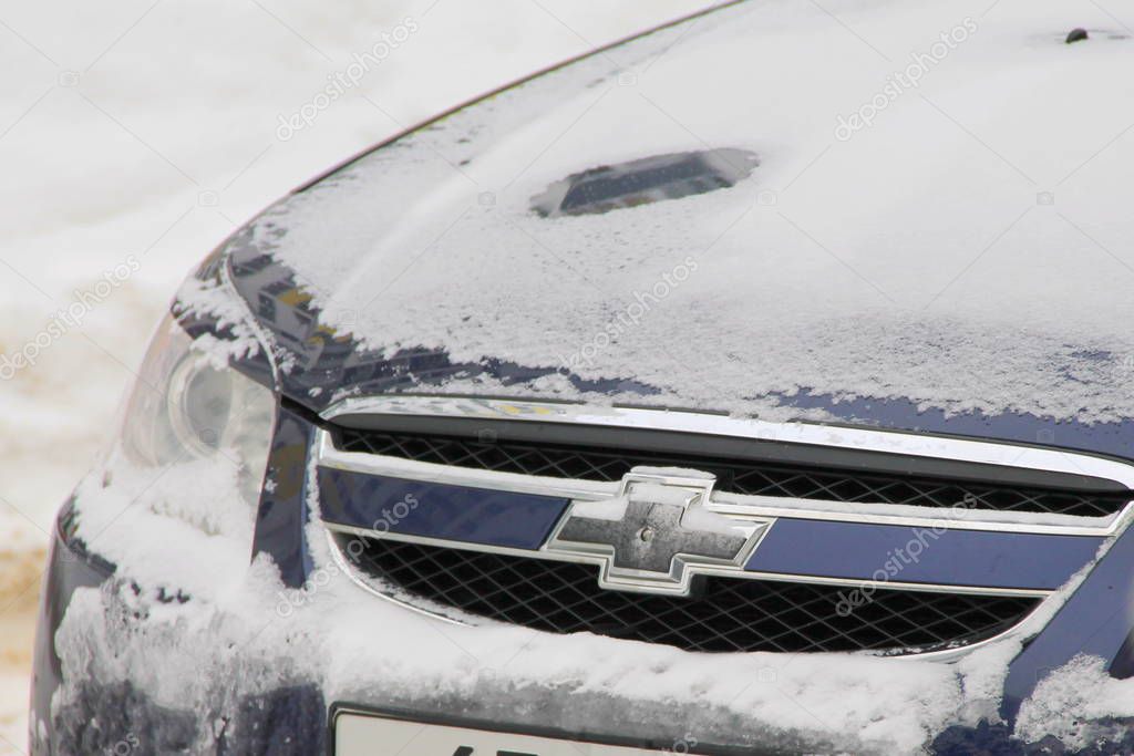 Chevrolet car logo closeup on the grille close-up.