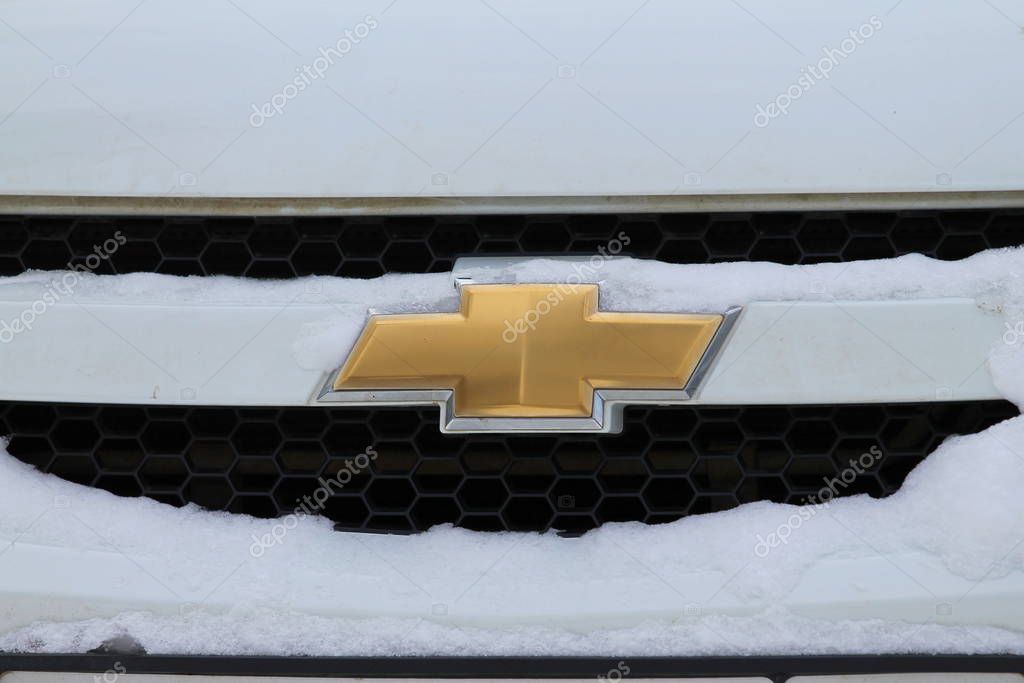 02.02.2020 - Syktyvkar, Russia. Chevrolet car logo closeup on the grille closeup.