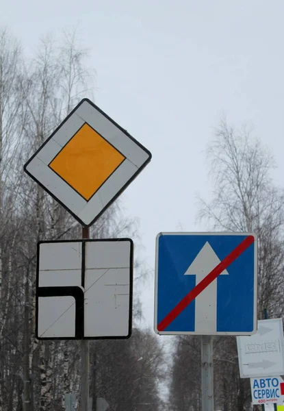 Road Signs Main Road End One Way Traffic Turn Crossed — Stock Photo, Image