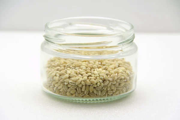 Glass Jar Barley White Background Side View Concept Healthy Nutrition — Stock Photo, Image